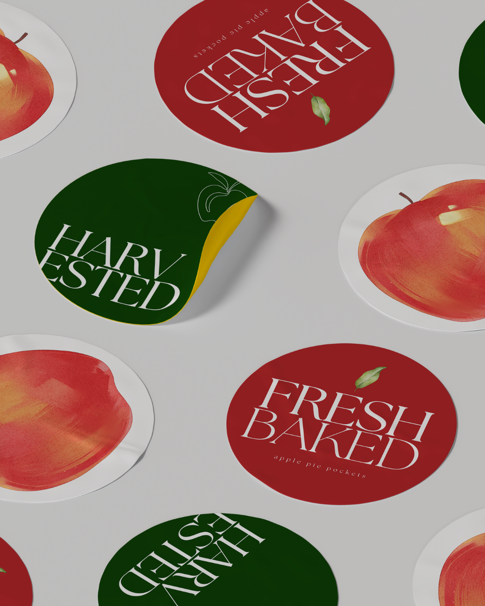 Die-cut stickers with 'Harvested' and 'Fresh Baked' text on a white background